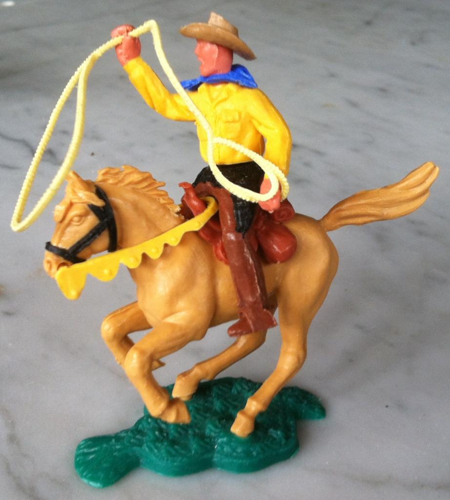cow-boy à cheval lasso